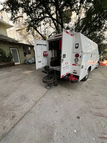 Magnet Plumbing service vehicle on-site for Grease Trap Cleaning in Timberlake